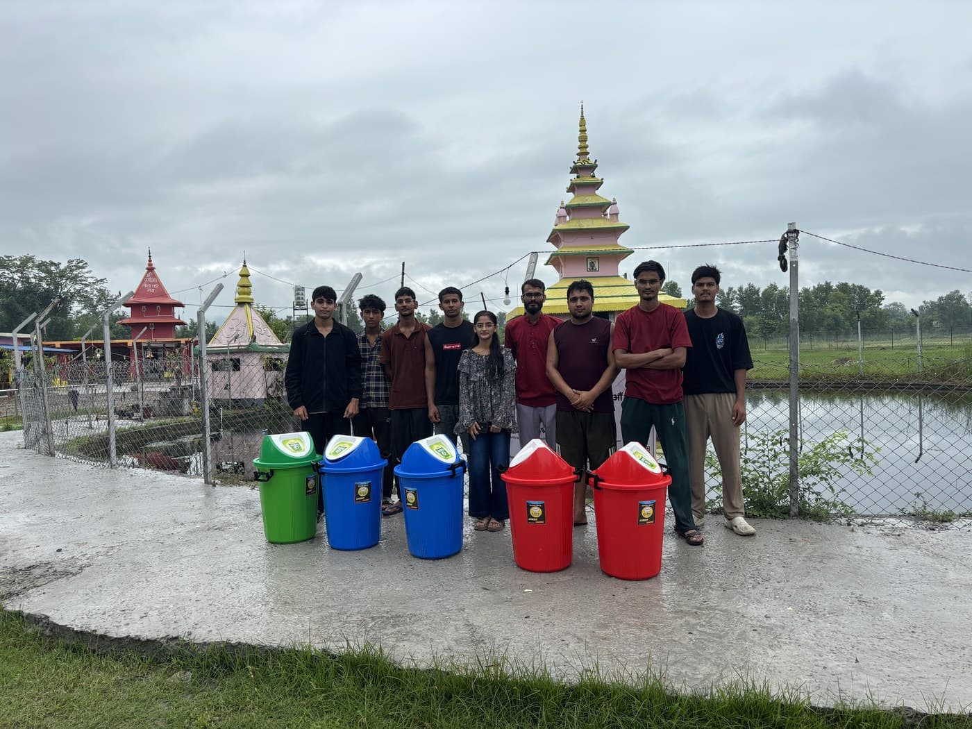 PlayClean Nepal volunteers with new dustbins installed at Bhamkeswar Mandir, Sisaiya